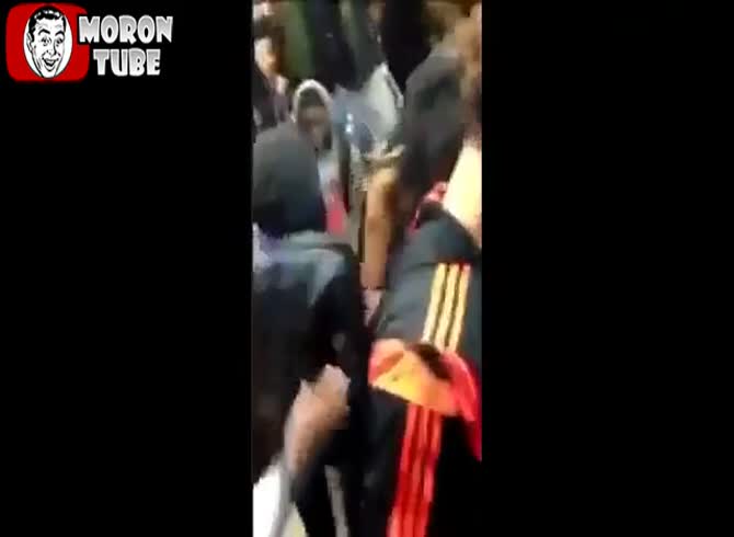 Video :beaten severely by many individuals for walking past in front of everyone in a fast-food restaurant (warning the audience)